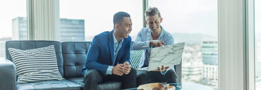 Man and Woman Working on a Lap